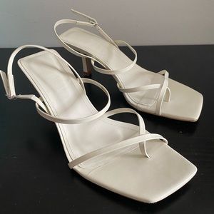 Strappy mid-heeled leather sandal